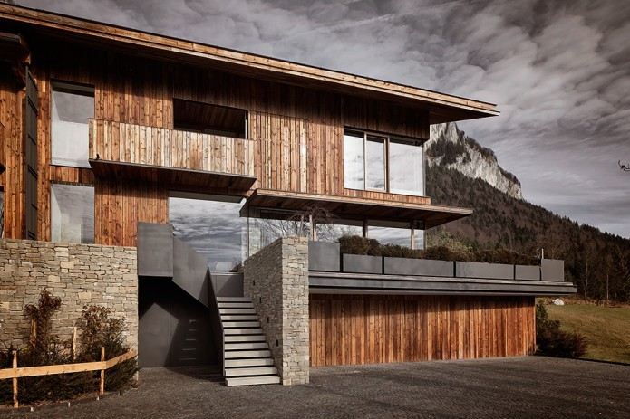 wood panel home in mountains